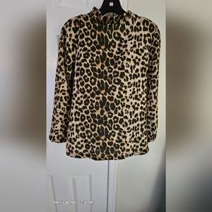 "No name" eopard blouse . I believe this was purchased from Venus catalog.